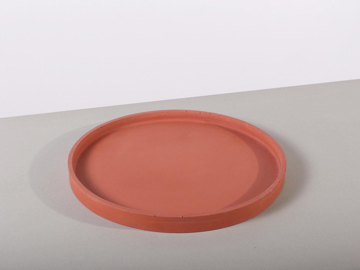 red concrete tray round