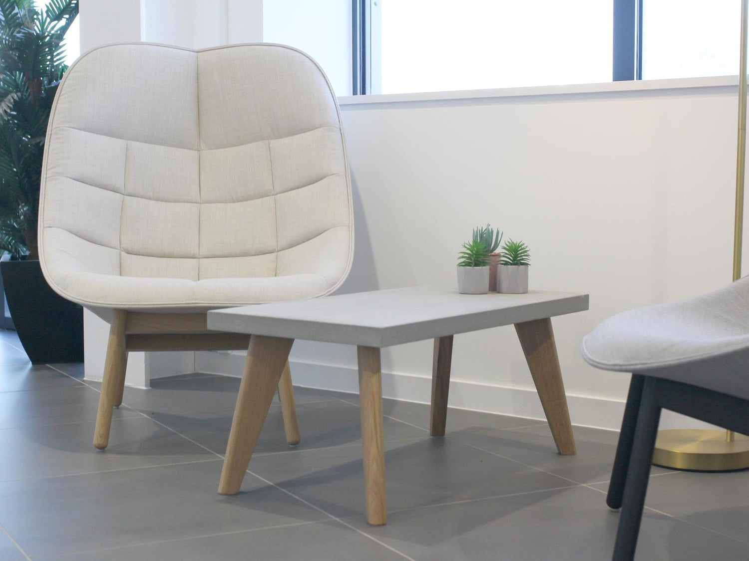 Large concrete table with oak legs