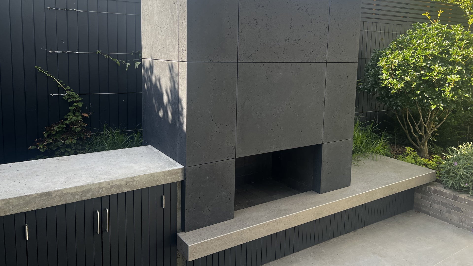 outdoor garden fireplace in concrete
