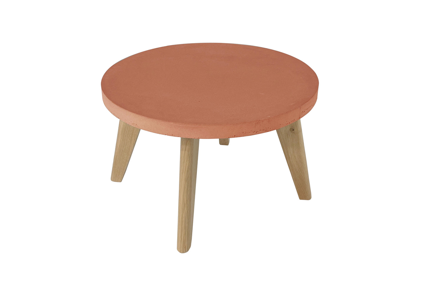 Round table with terracotta-coloured top on a white background