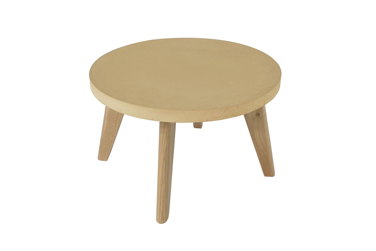 Round concrete table with four legs on a white background