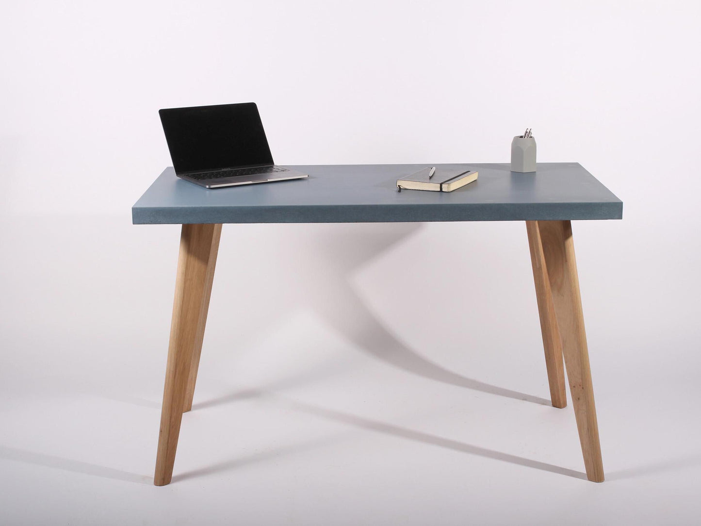 blue concrete table for home office desk with oak legs