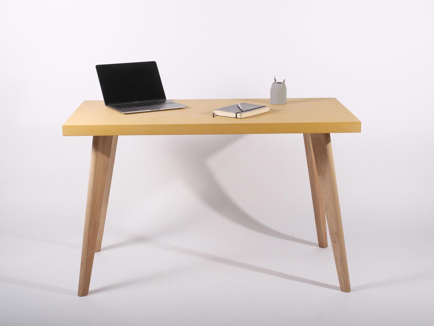 yellow concrete table for home office desk with oak legs