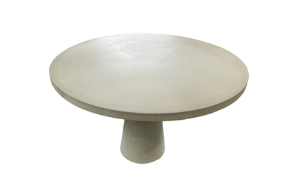 Round concrete table on a white background