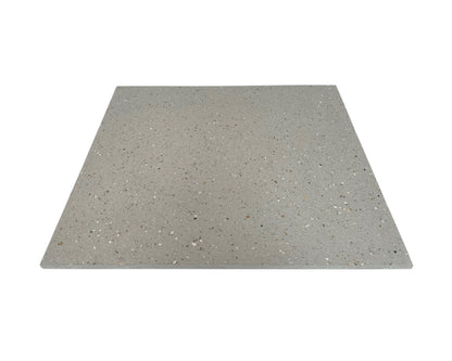 Square concrete tile with a speckled gray pattern on a white background