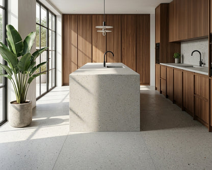 Modern kitchen with a concrete island and wooden cabinets.