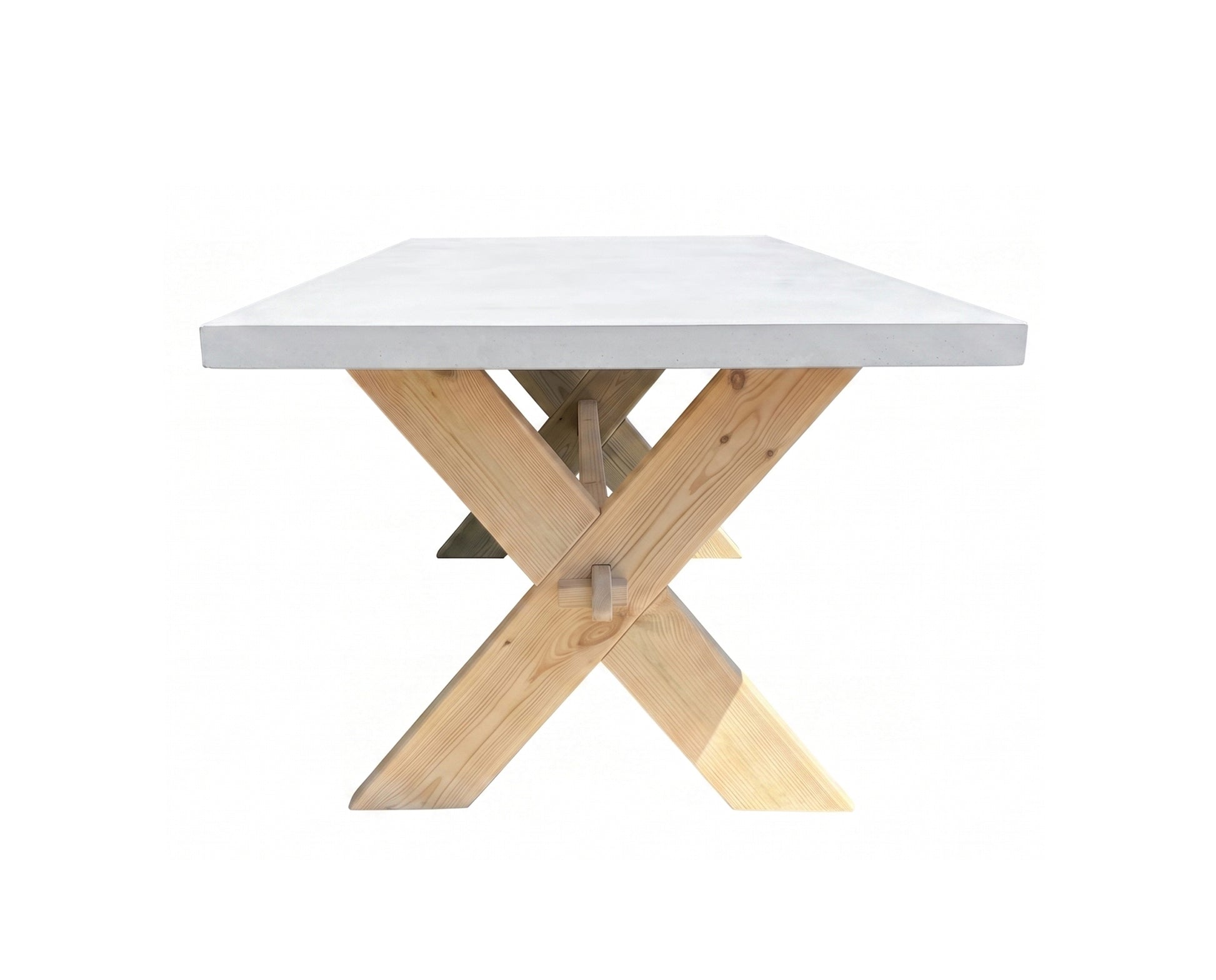 A square dining table with a smooth light gray concrete top and a natural light wood X-shaped pedestal base, shown against a plain white background.