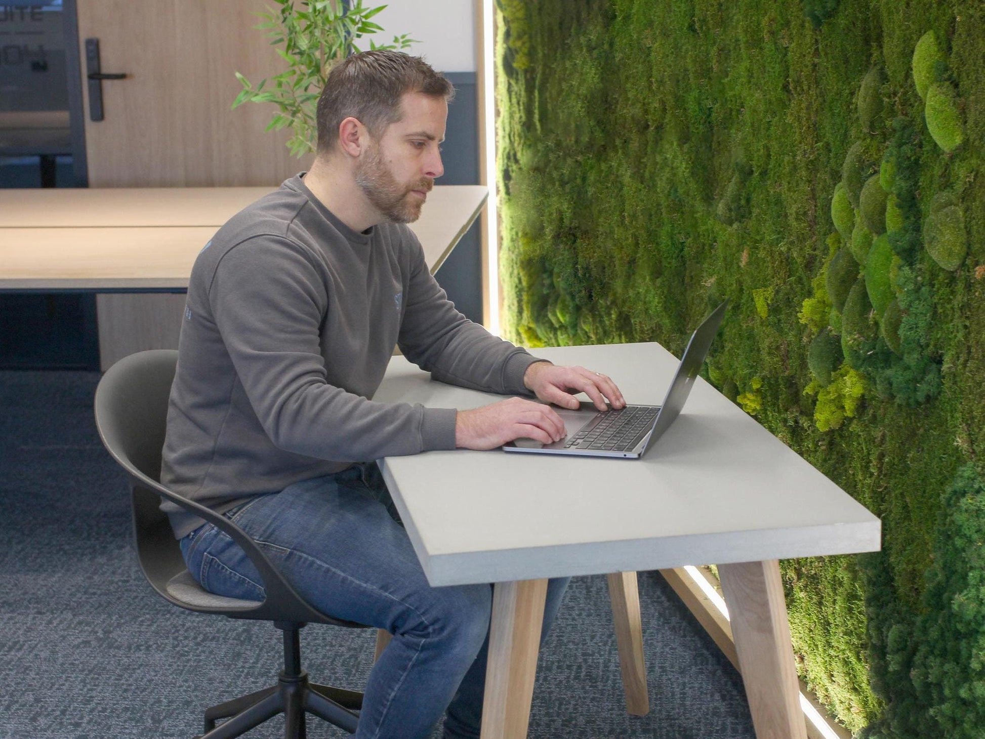 Grey concrete table for home office desk with oak legs