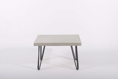 rectangular table with a light gray top and black metal legs on a white background