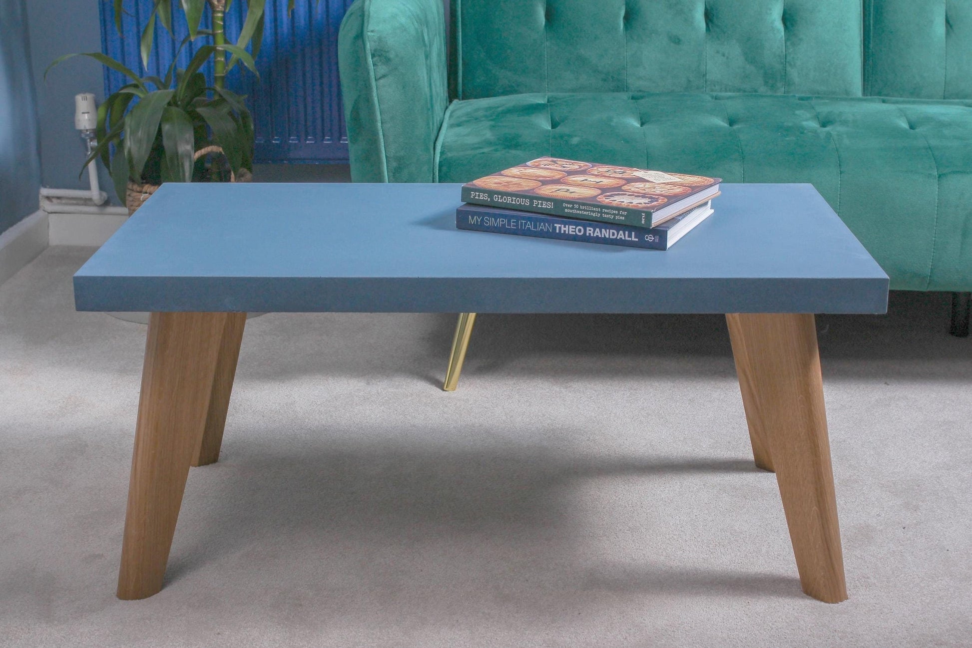 Large blue concrete table with oak legs