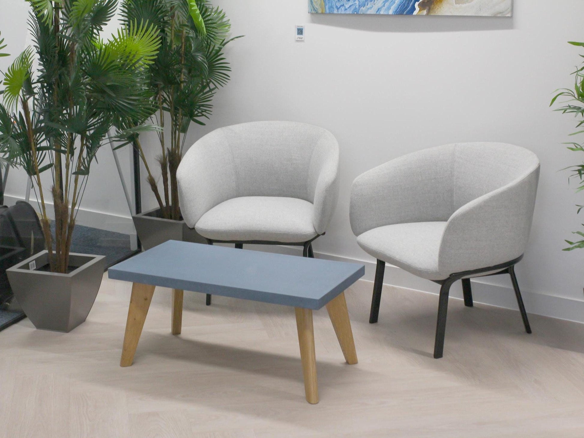 Large blue concrete table with oak legs