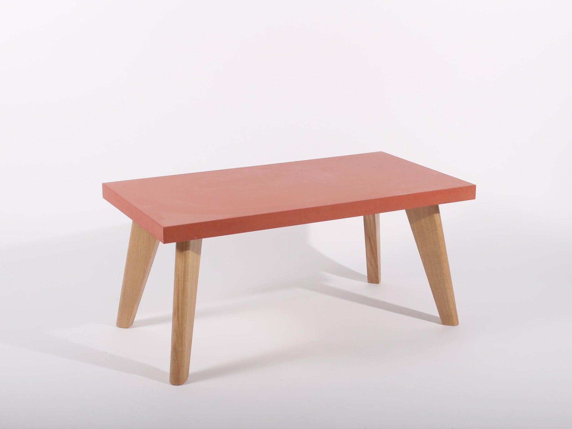 Large red concrete table oak legs