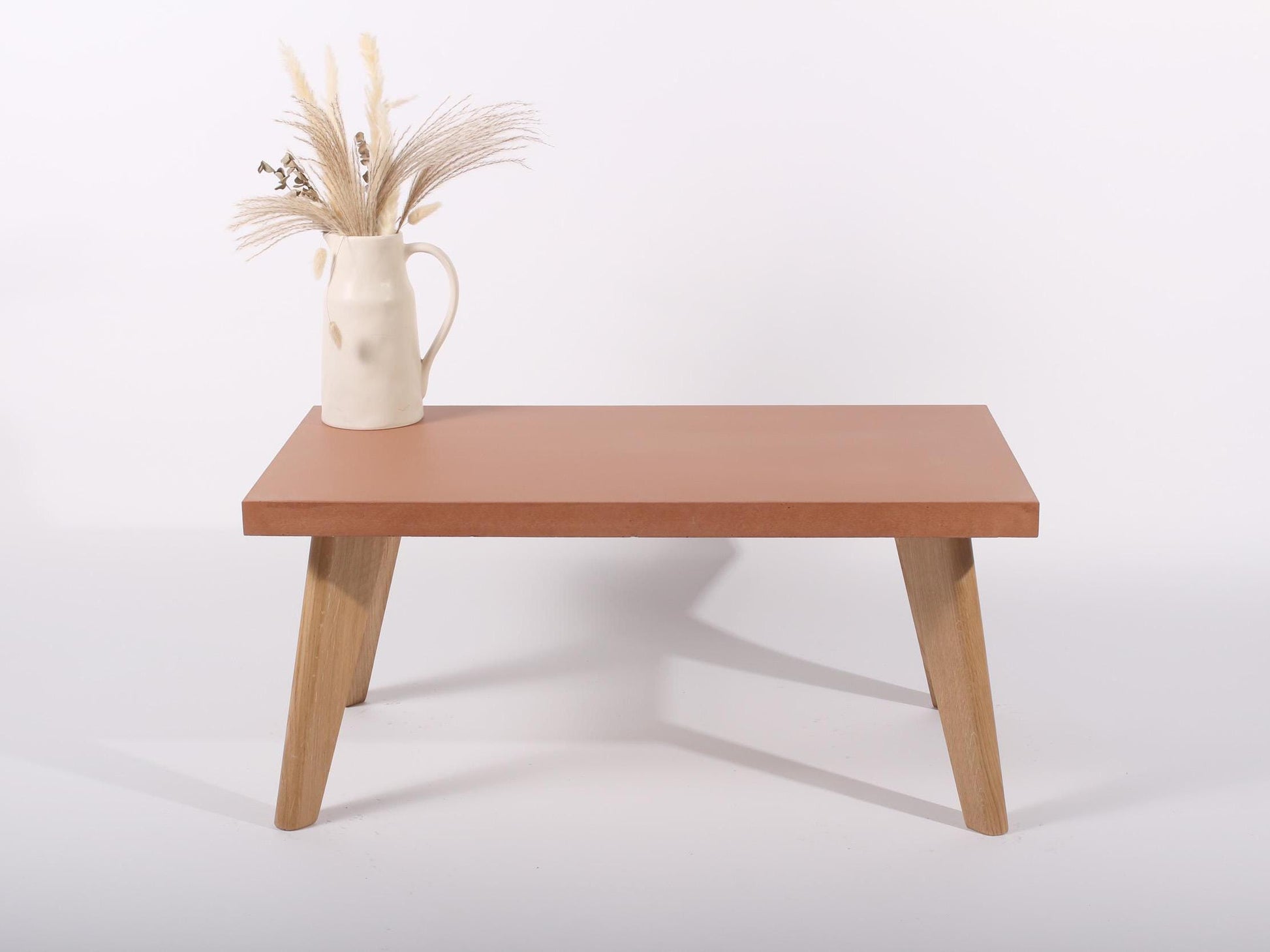 Large terracotta concrete table Oak legs