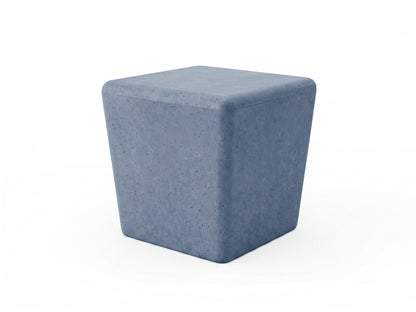Blue cube-shaped concrete stool on a white background