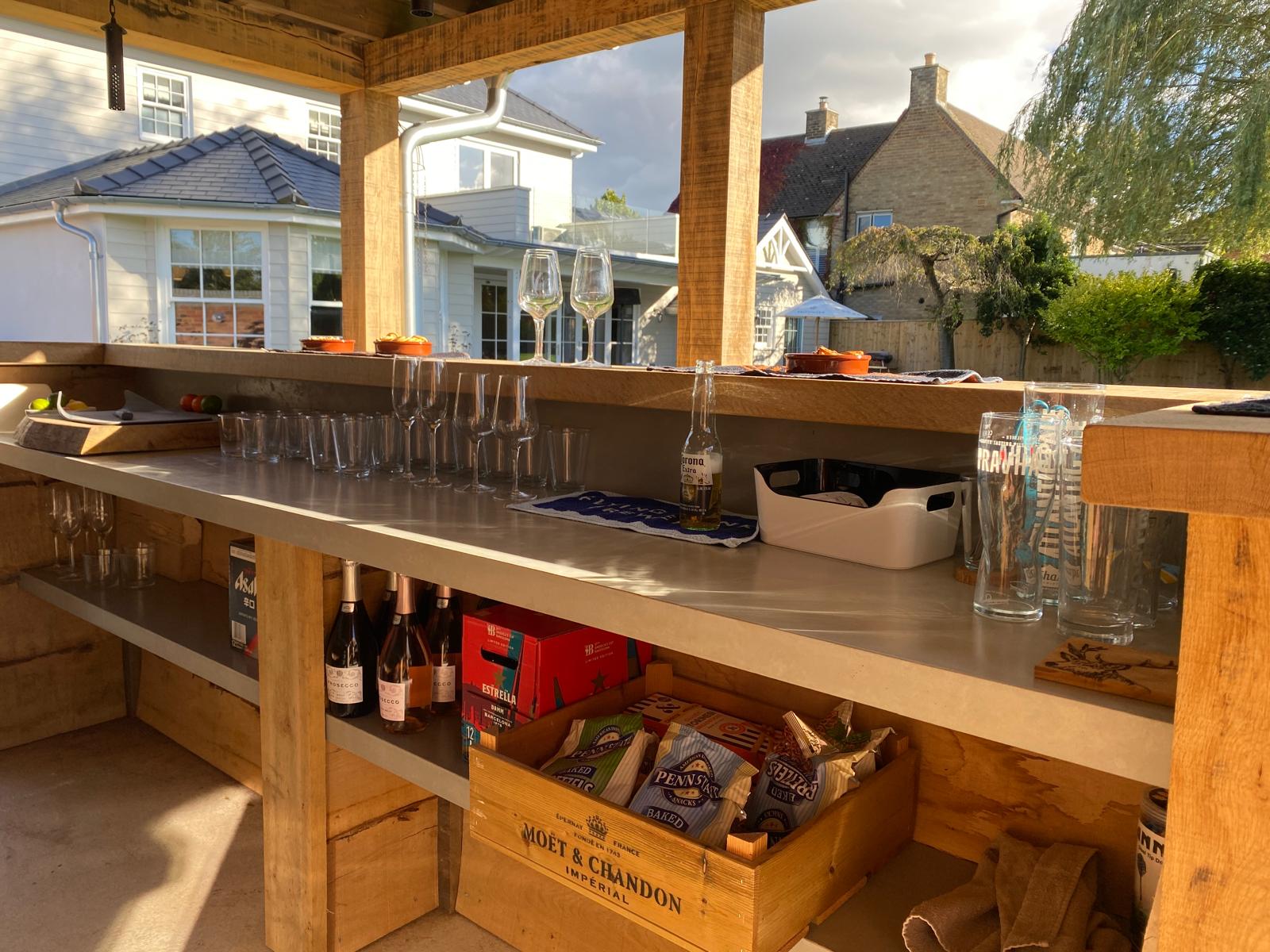 Outdoor kitchen with concrete table top