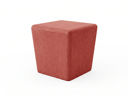 Red cube-shaped concrete stool on a white background