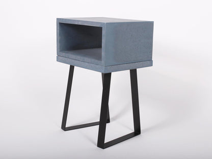 Blue concrete bedside table with trapezium legs 