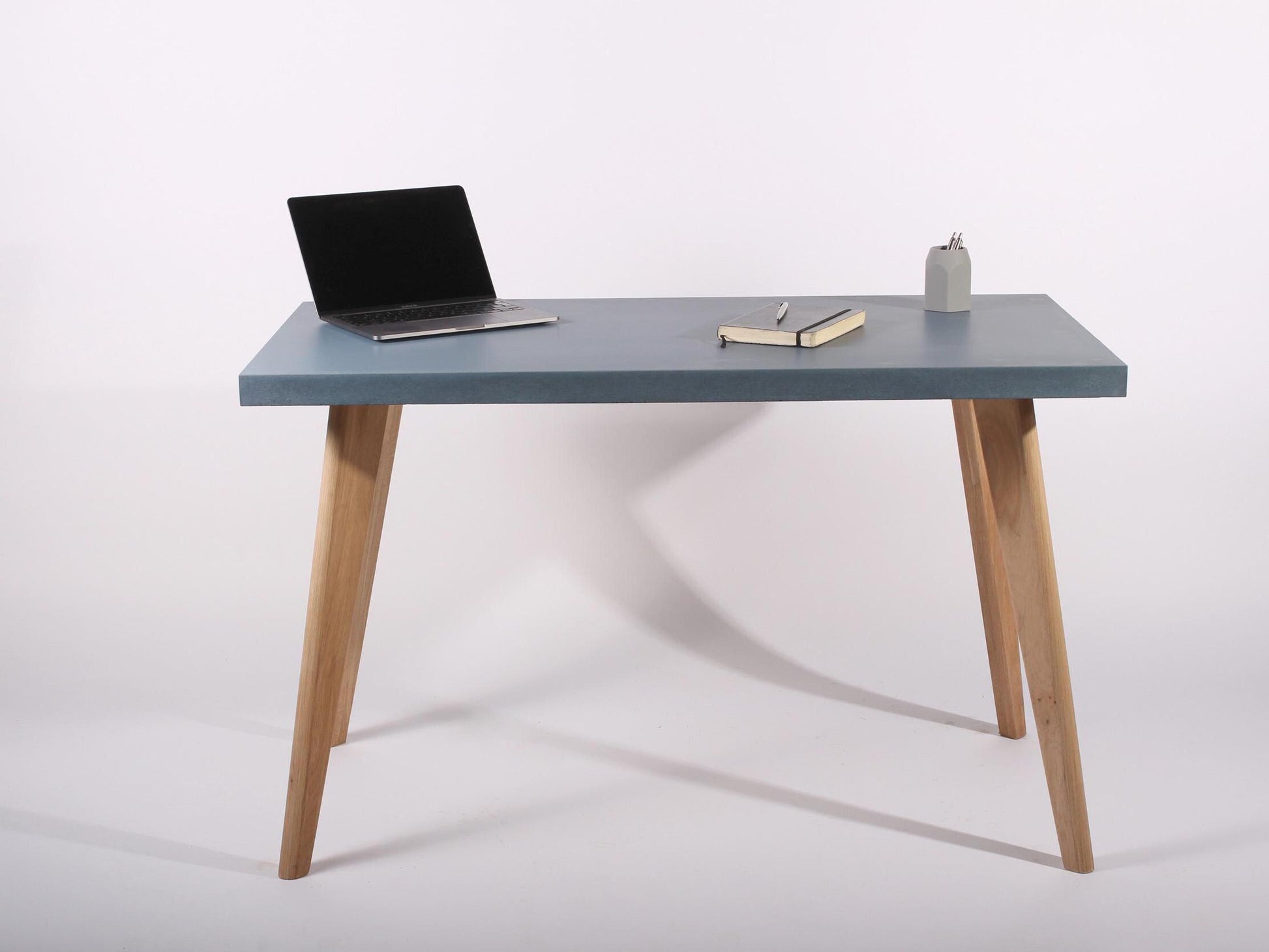 blue concrete table for home office desk with oak legs