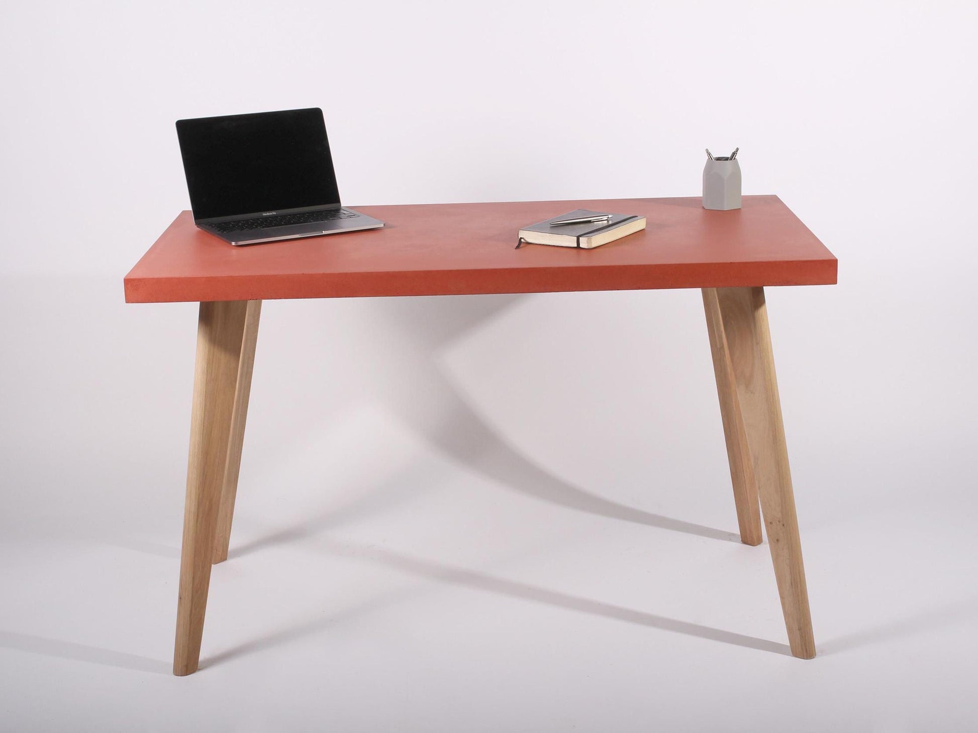 red concrete table for home office desk with oak legs