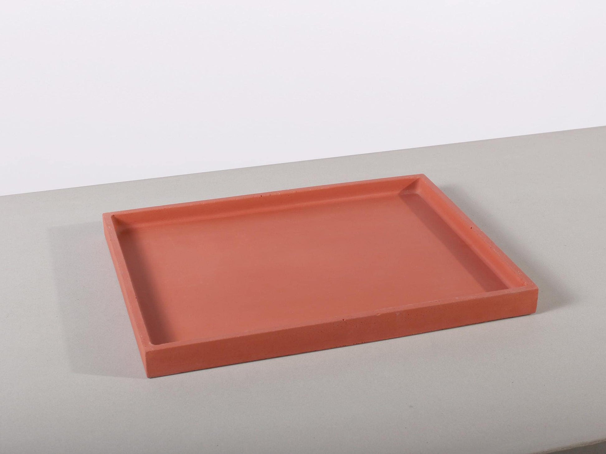 red large decorative concrete tray