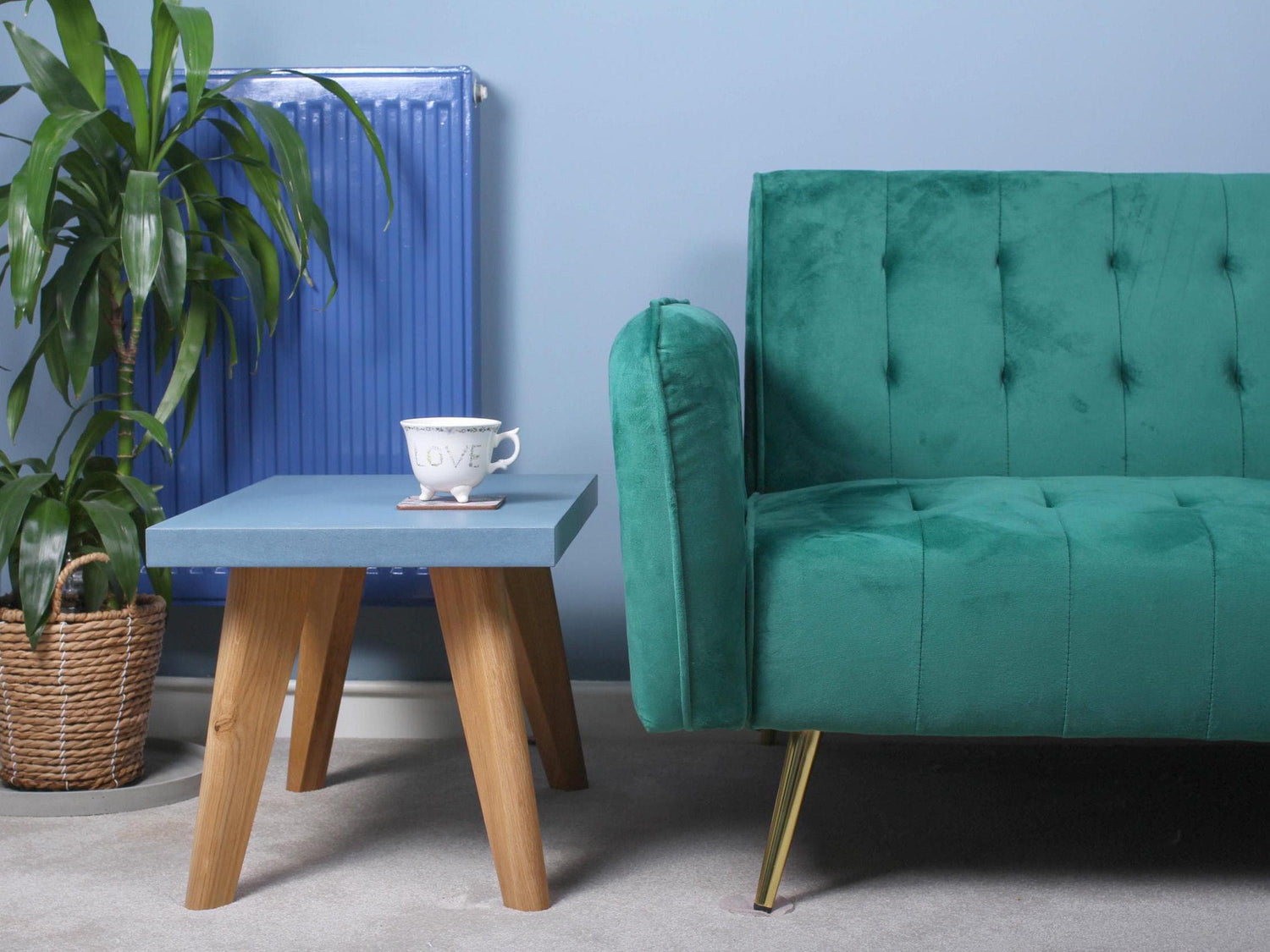 small blue concrete table with oak leg