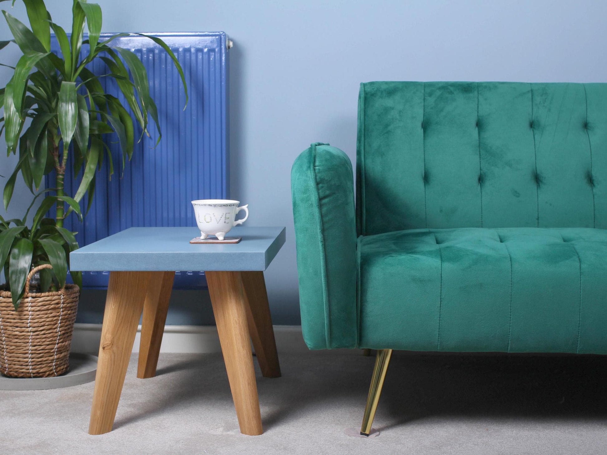 small blue concrete table with oak leg