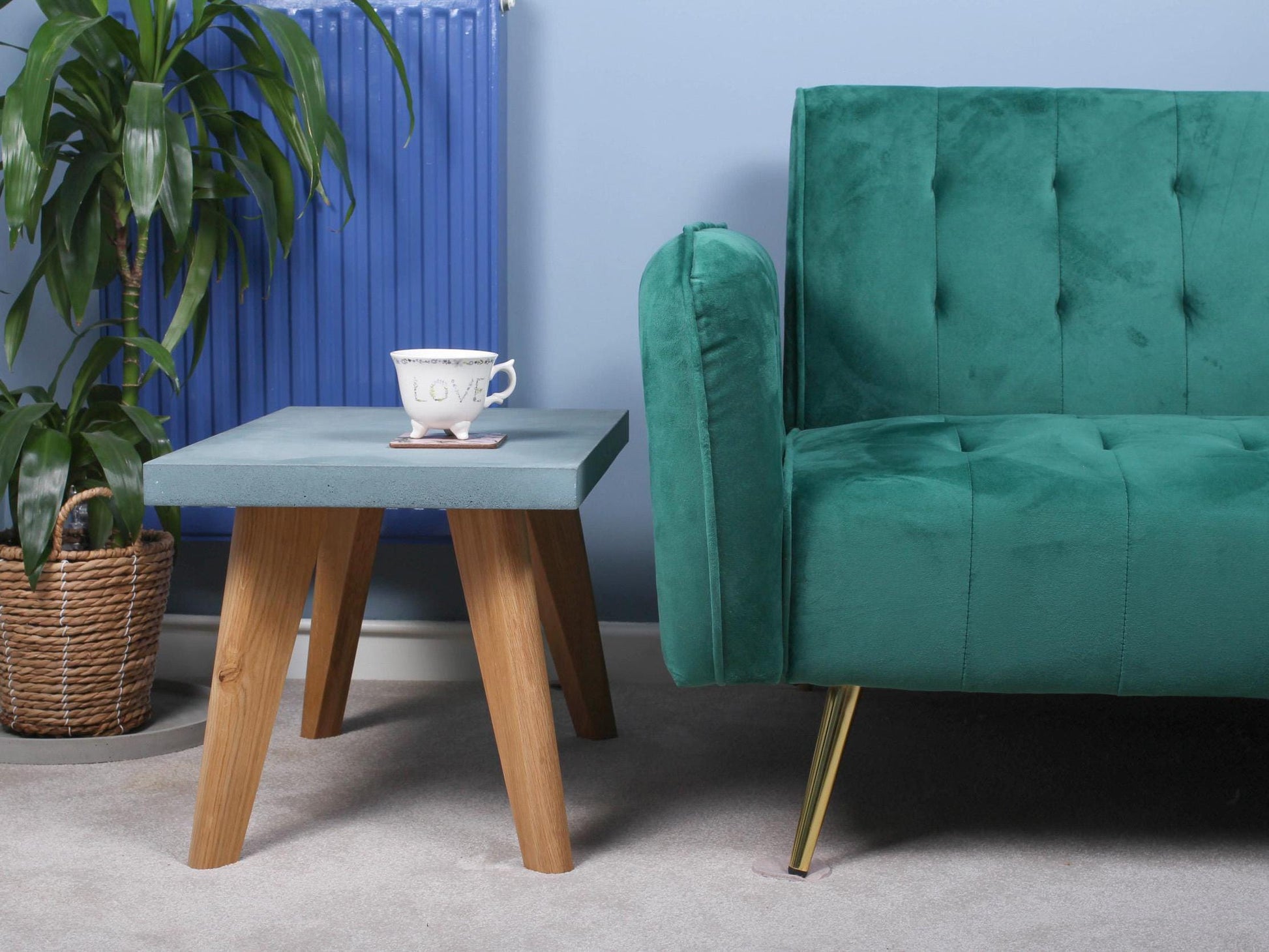 small blue concrete table  with cup of coffee