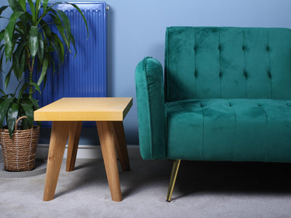 small yellow concrete table with oak leg