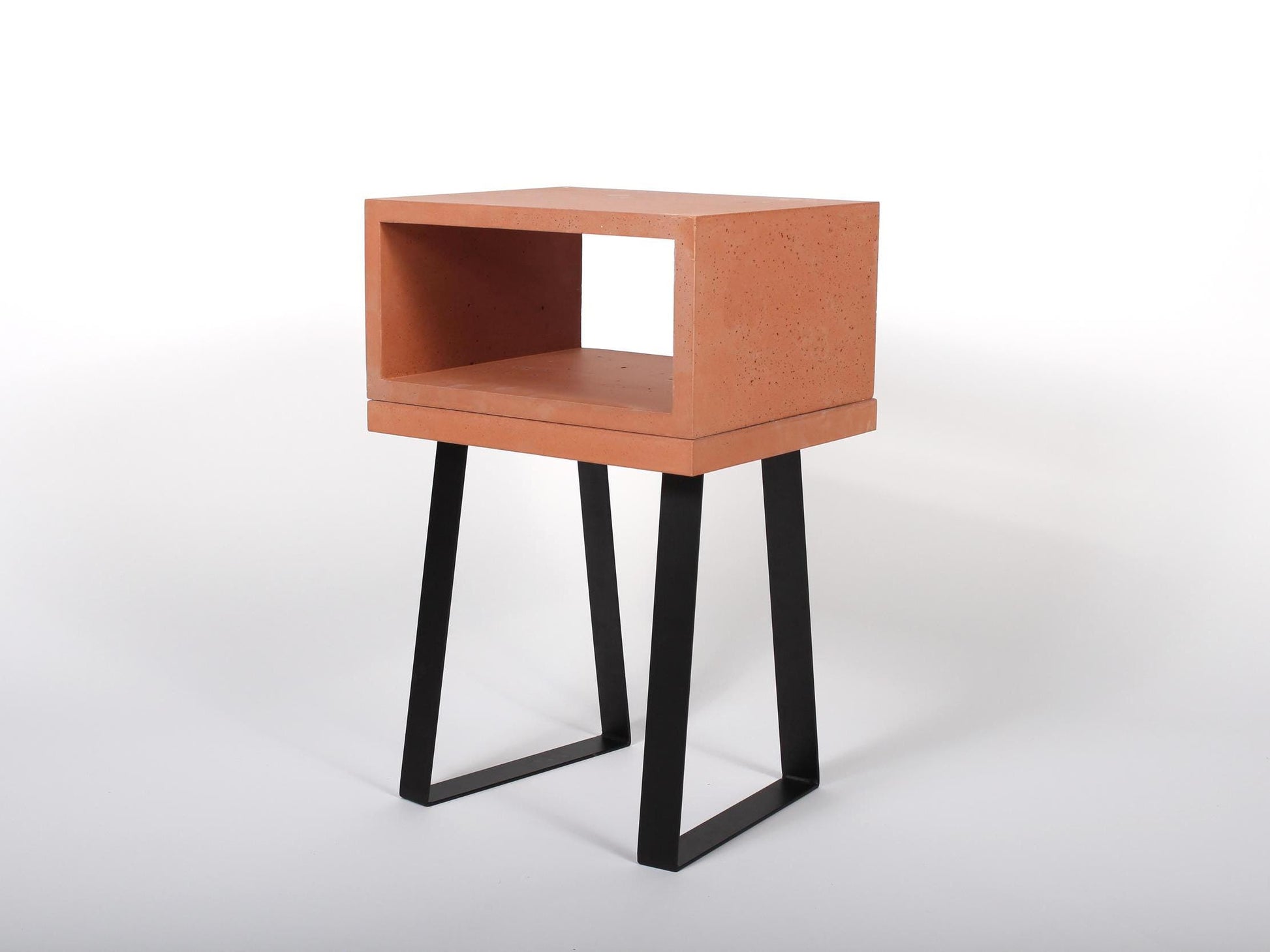 terracotta concrete bedside table with trapezium legs