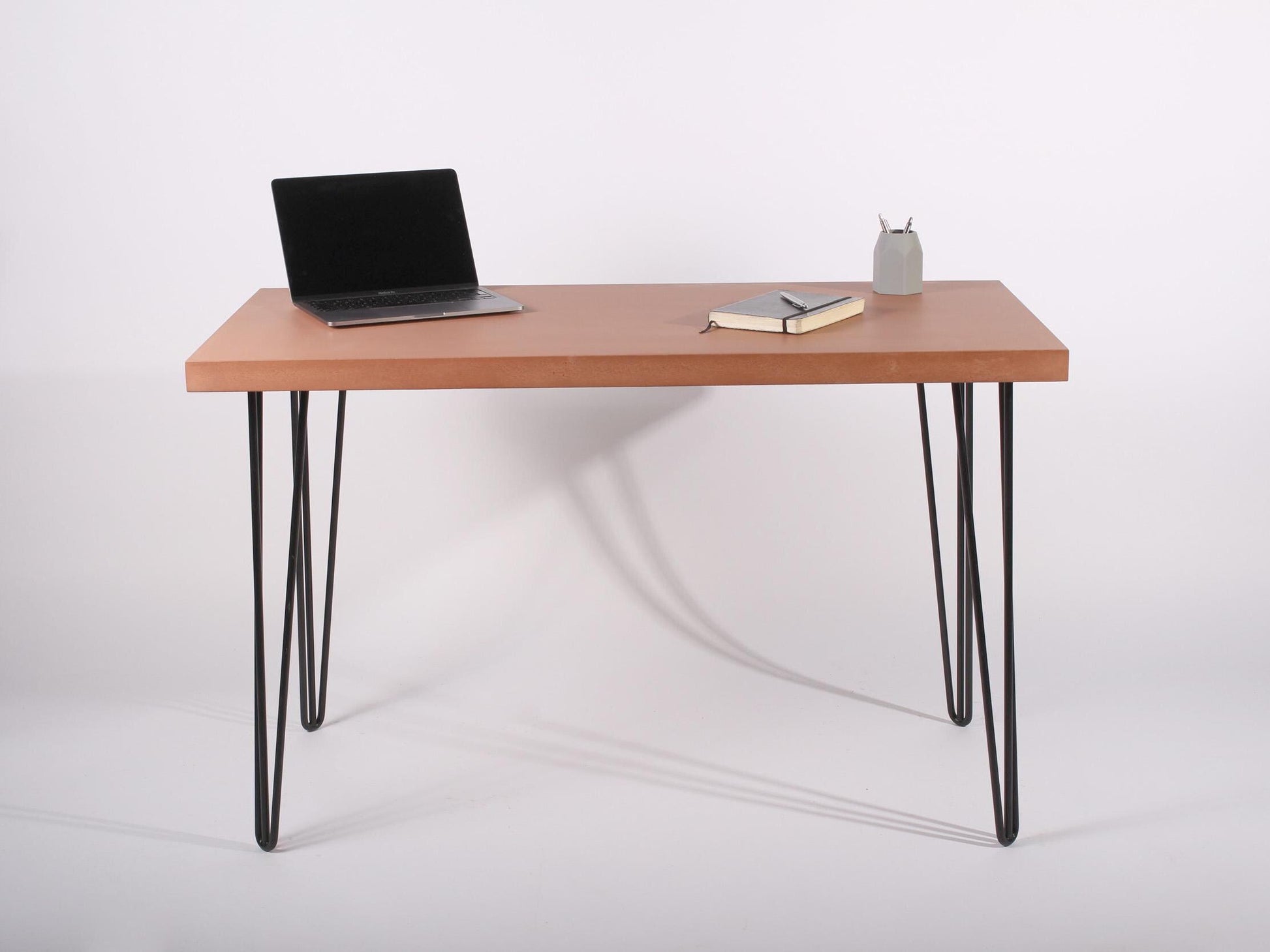 terracotta concrete home office desk with hairpin legs