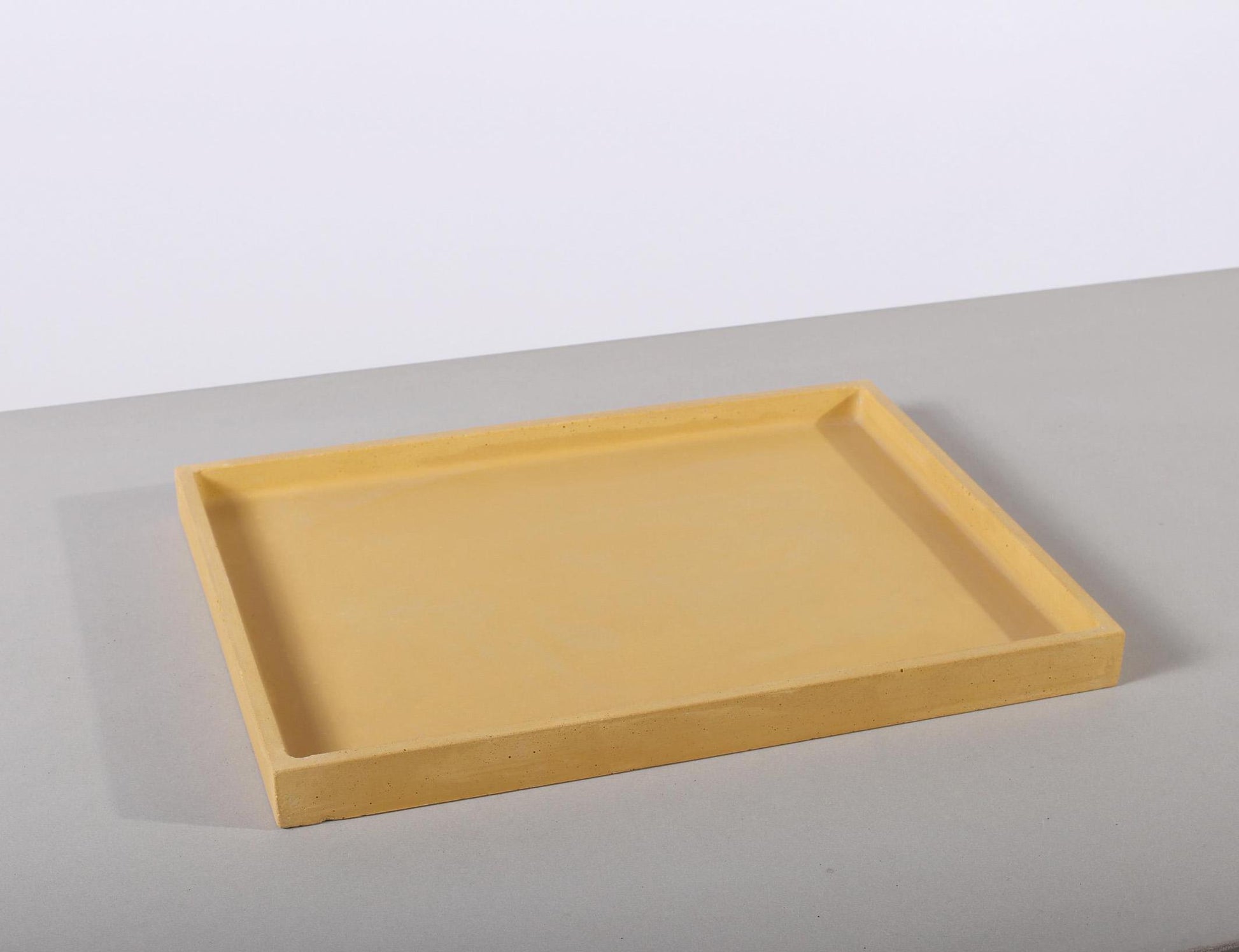 yellow large decorative concrete tray